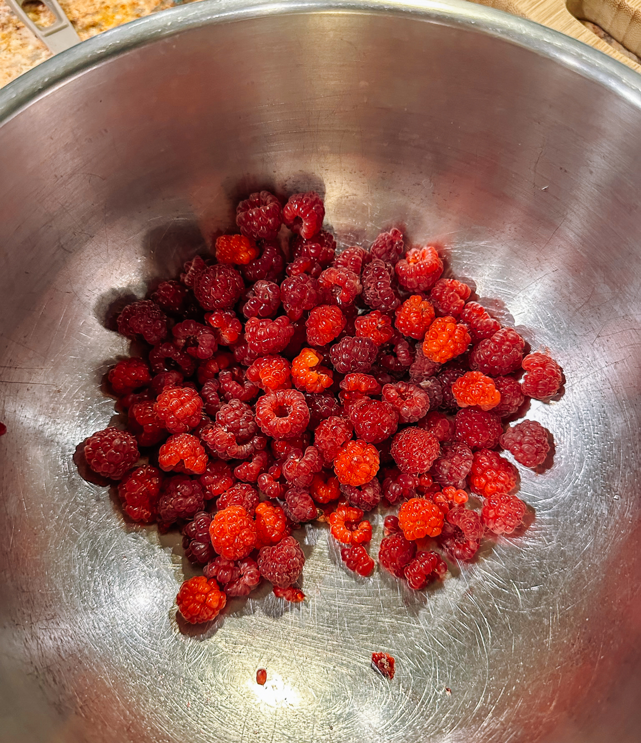 bowl of freshly picked raspberries