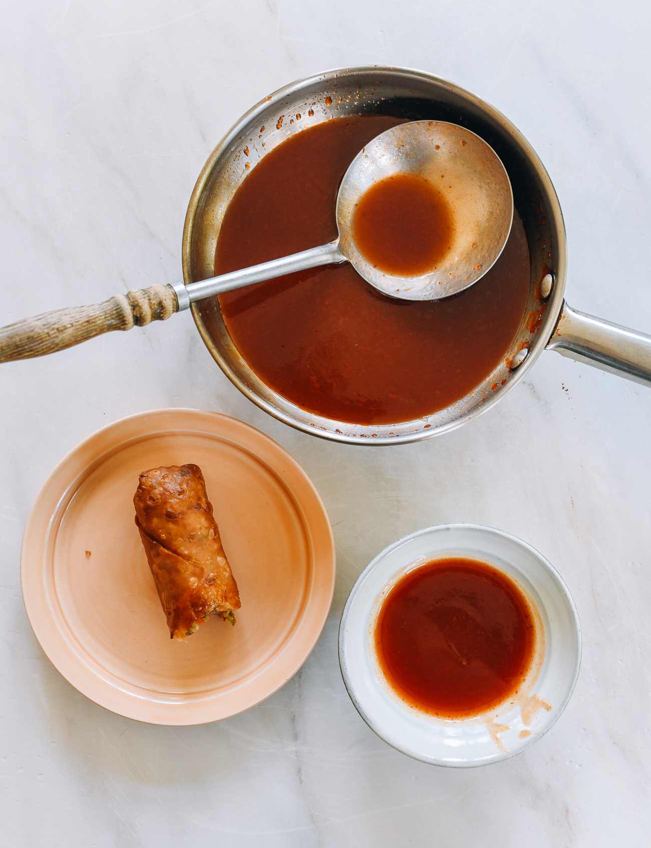 sweet and sour sauce served with fried takeout egg roll