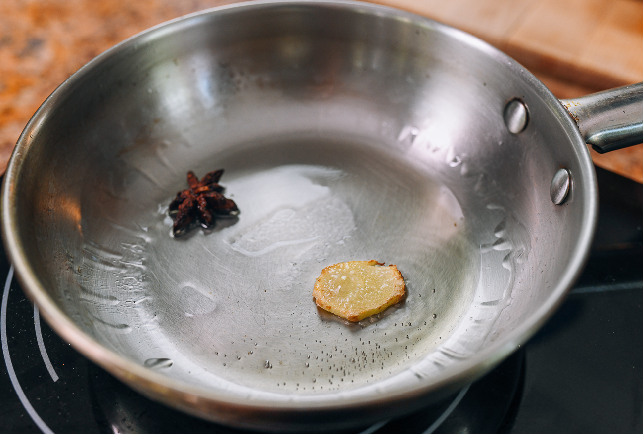ginger and star anise in saucepan
