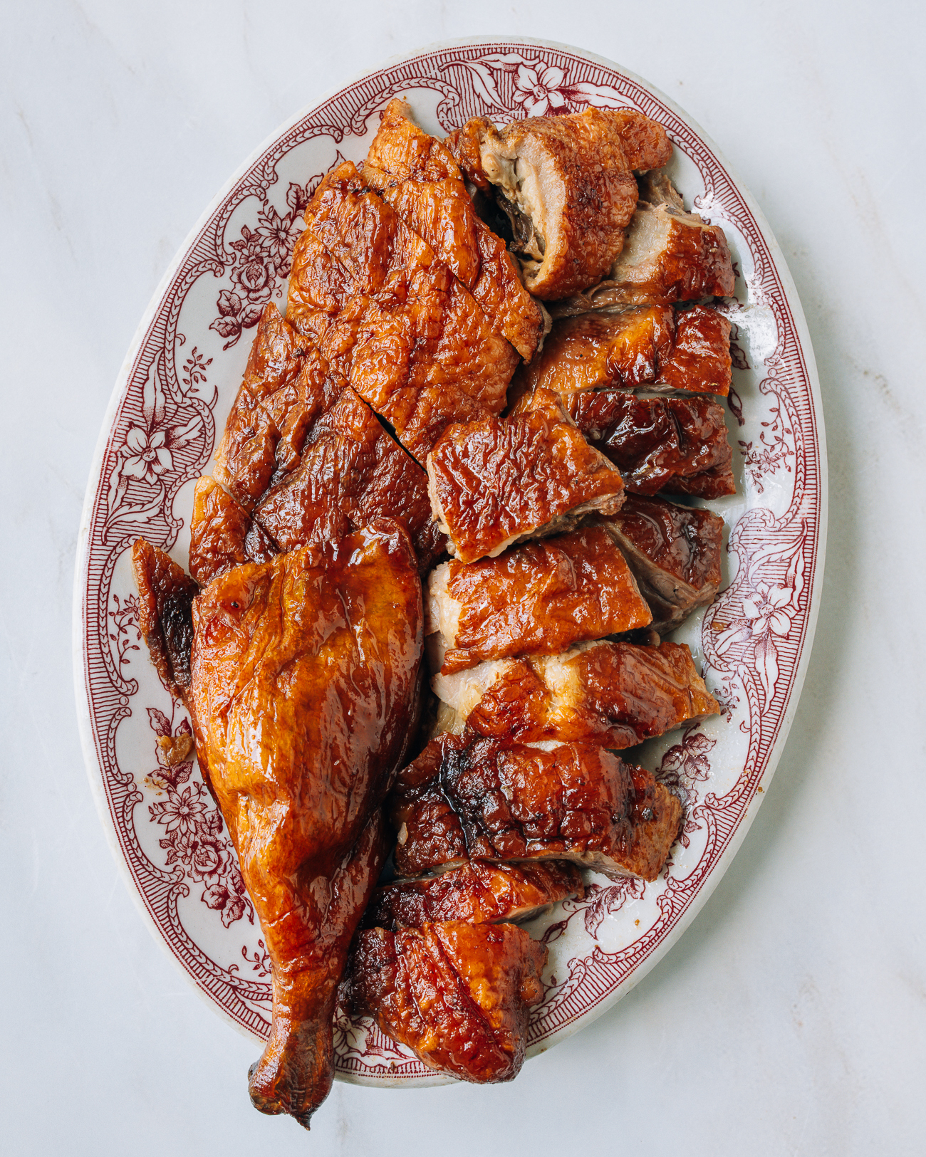 Chinese roast duck on platter