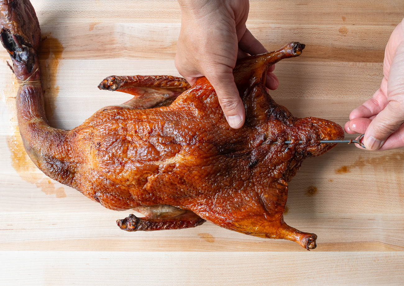 Chinese roast duck on cutting board