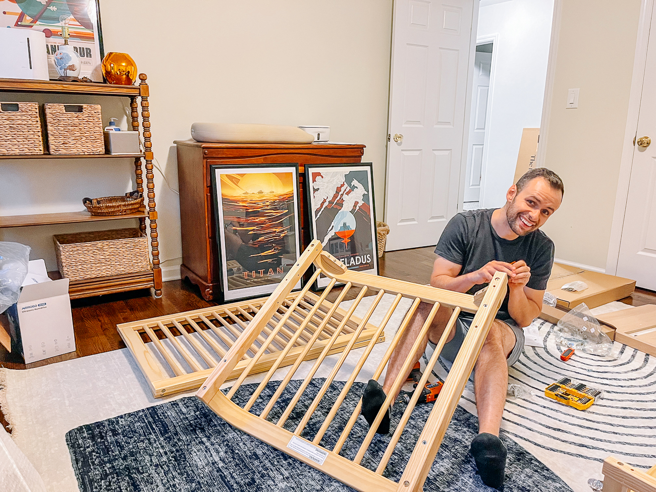 Justin assembling crib