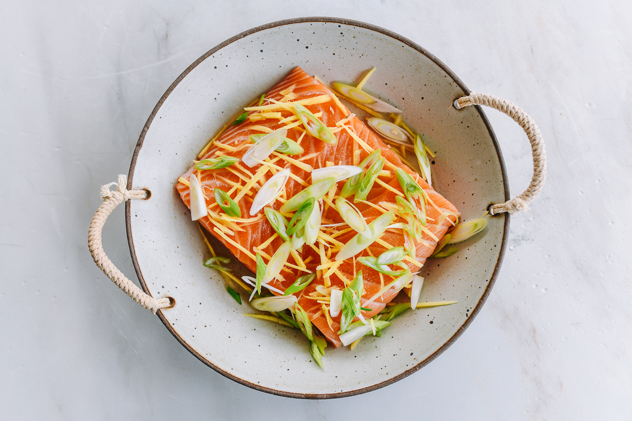 scallions on salmon fillet with ginger