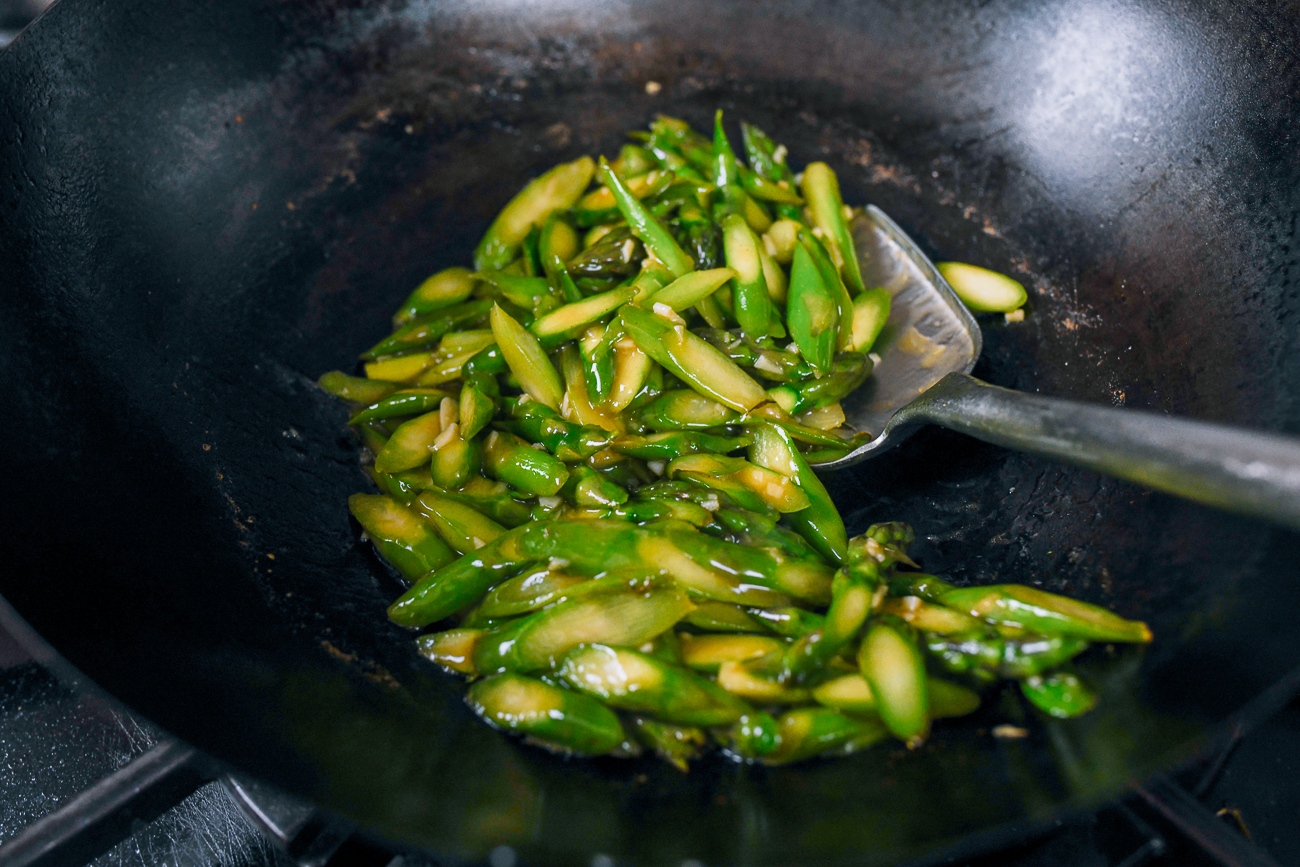 asparagus stir-fry in wok