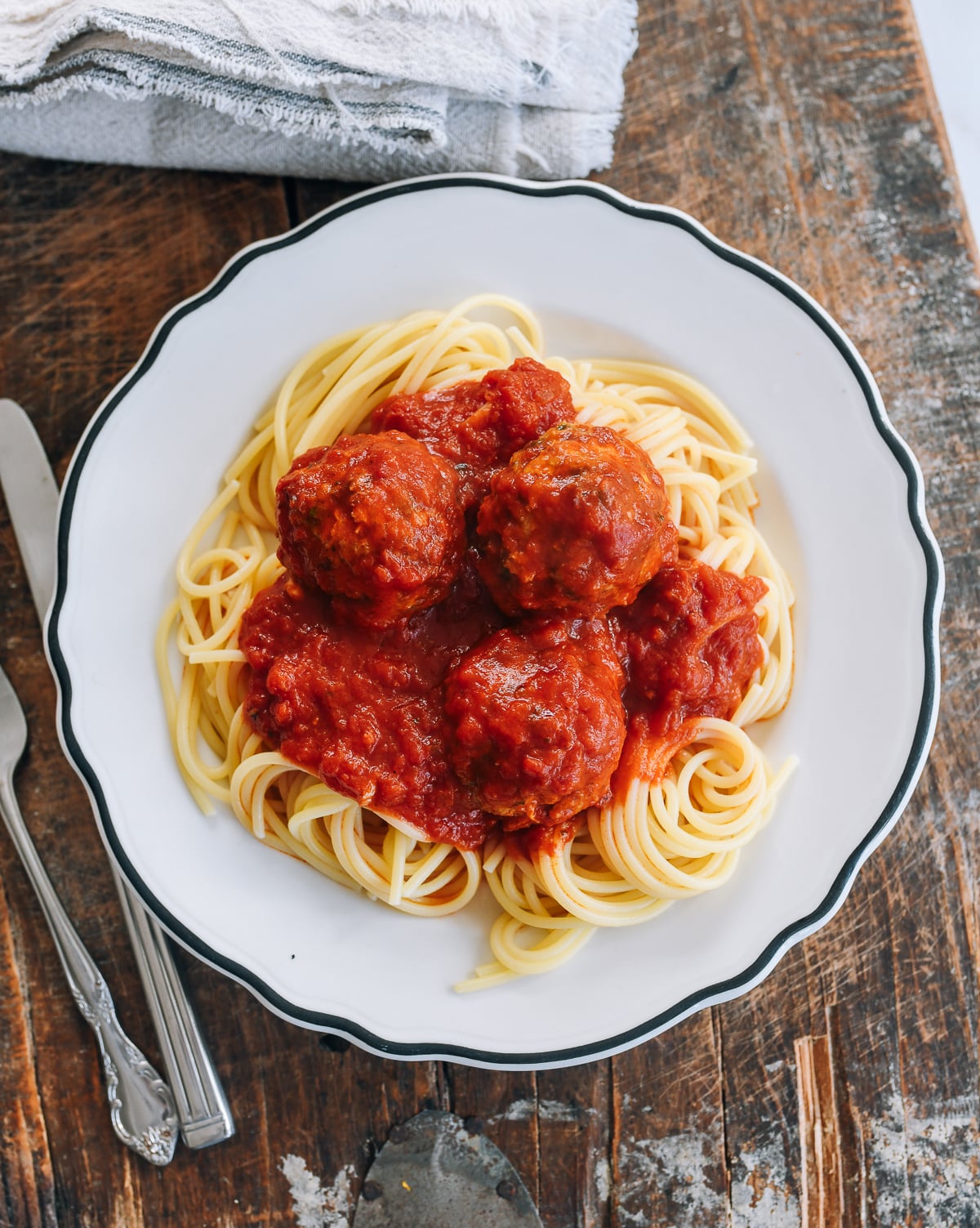meatballs in marinara sauce over spaghetti