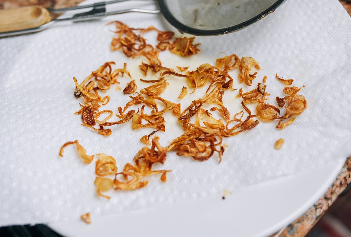 fried shallots on paper towel