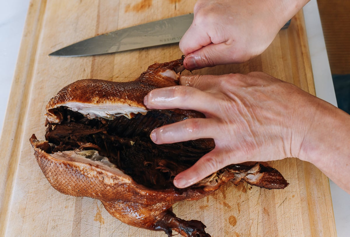 removing leg bones from cooked duck