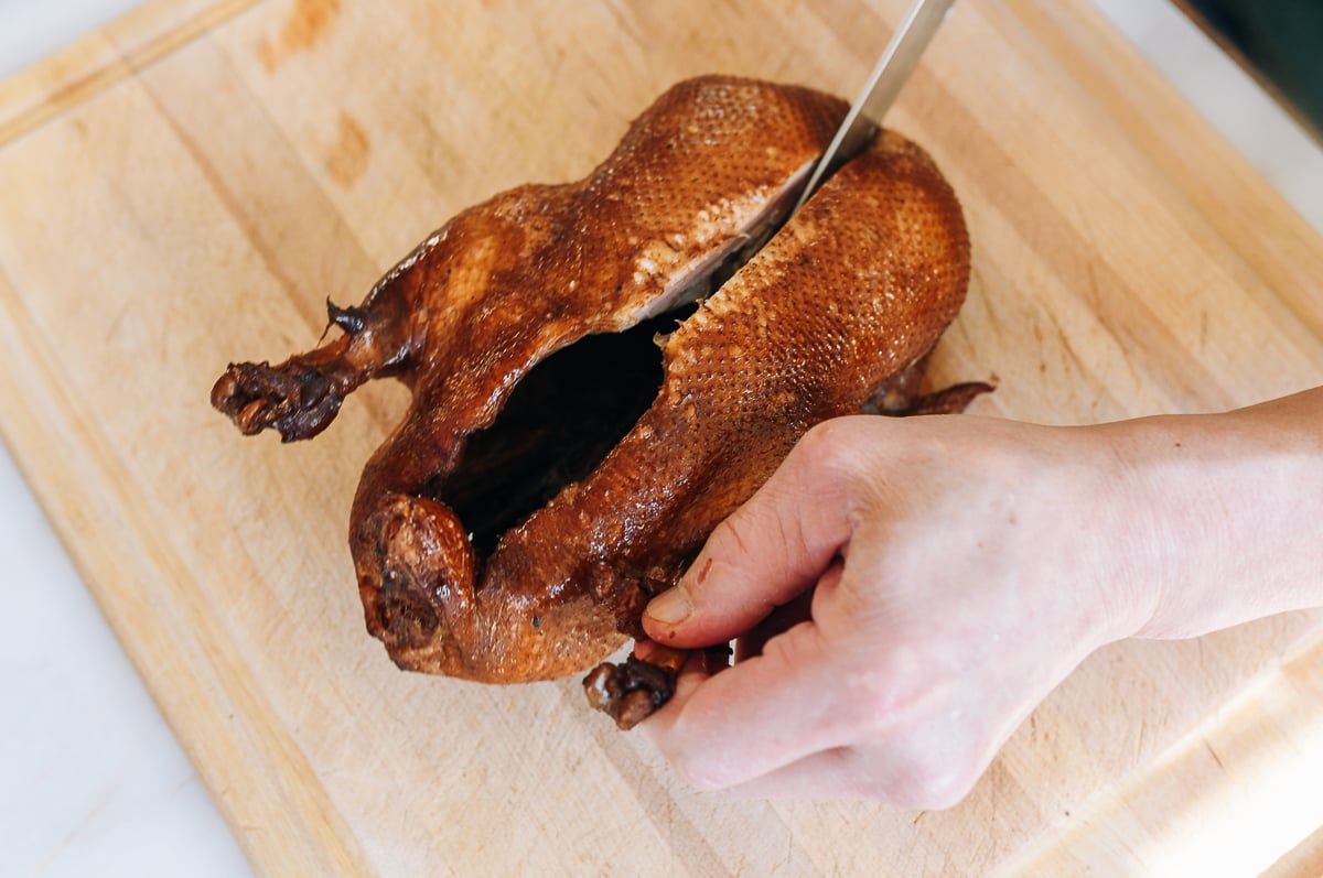 splitting duck open at breastbone