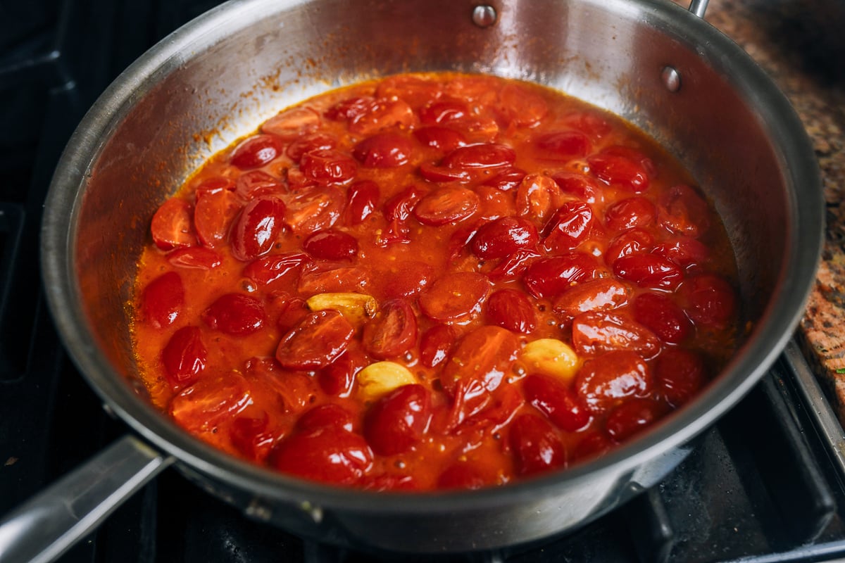 tomatoes breaking down into a sauce