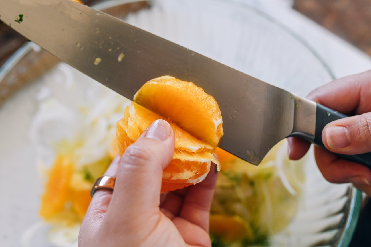 supreming orange with chef's knife