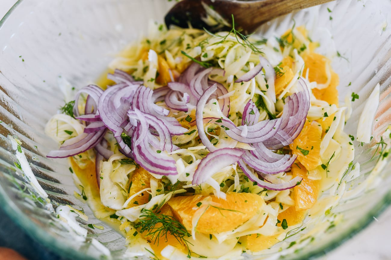 red onion, fennel, and orange segments in bowl