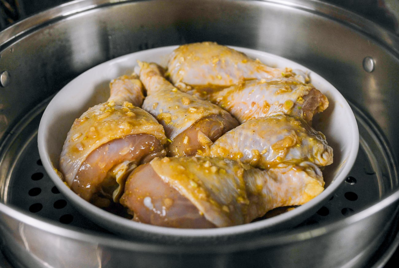 marinated chicken legs in steamer
