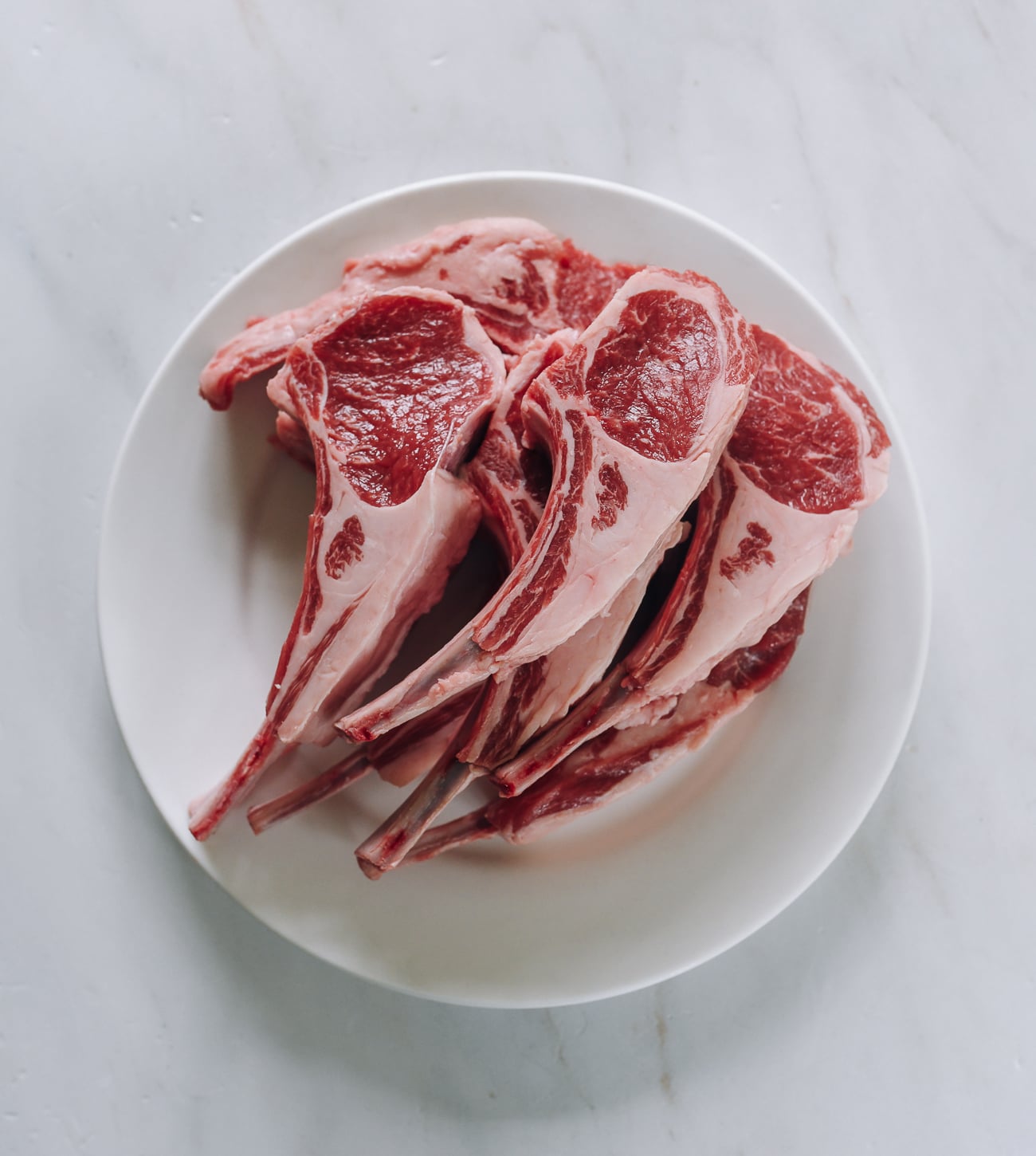 fatty lamb chops cut from rack of lamb