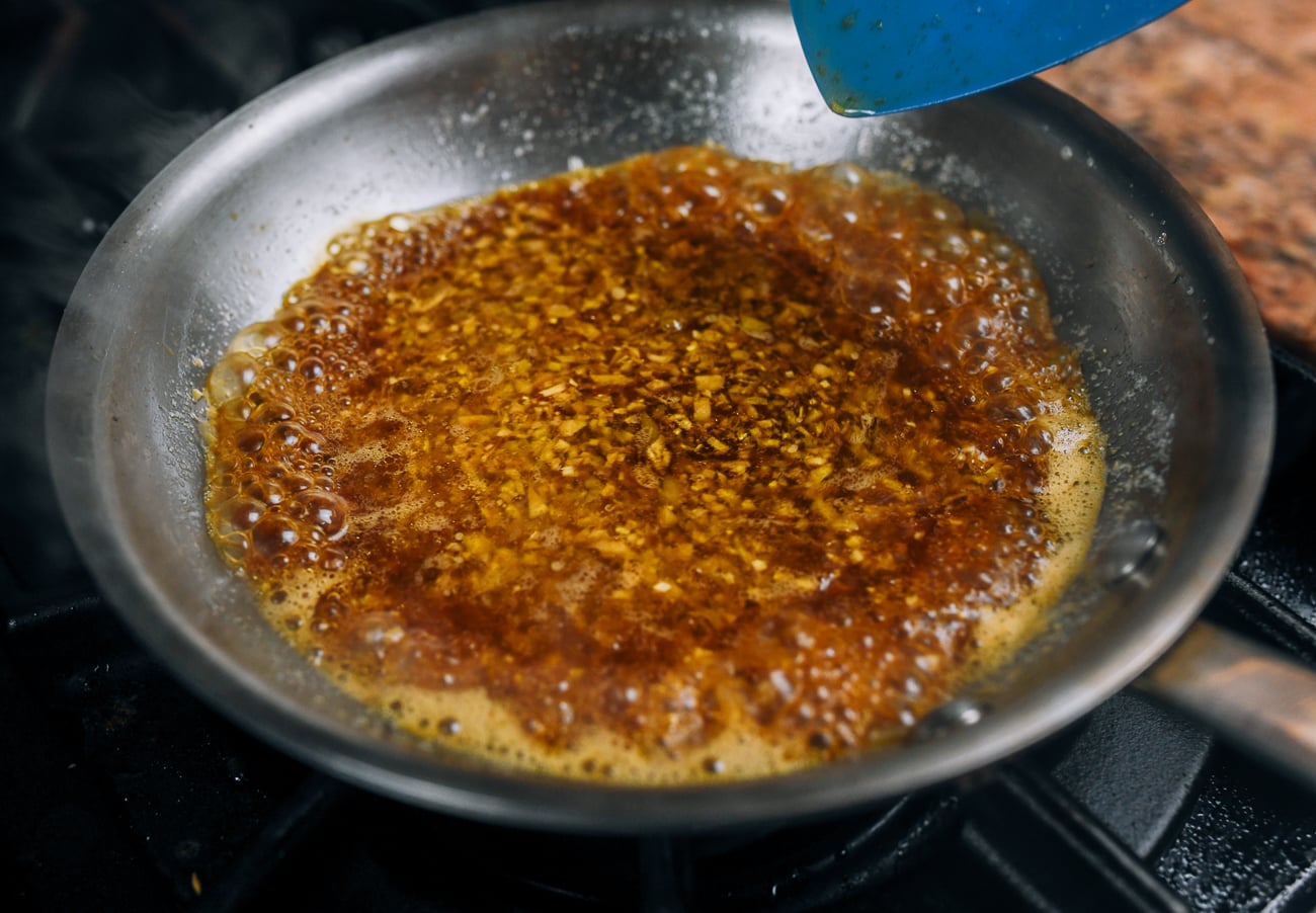 soy garlic butter mixture in pan