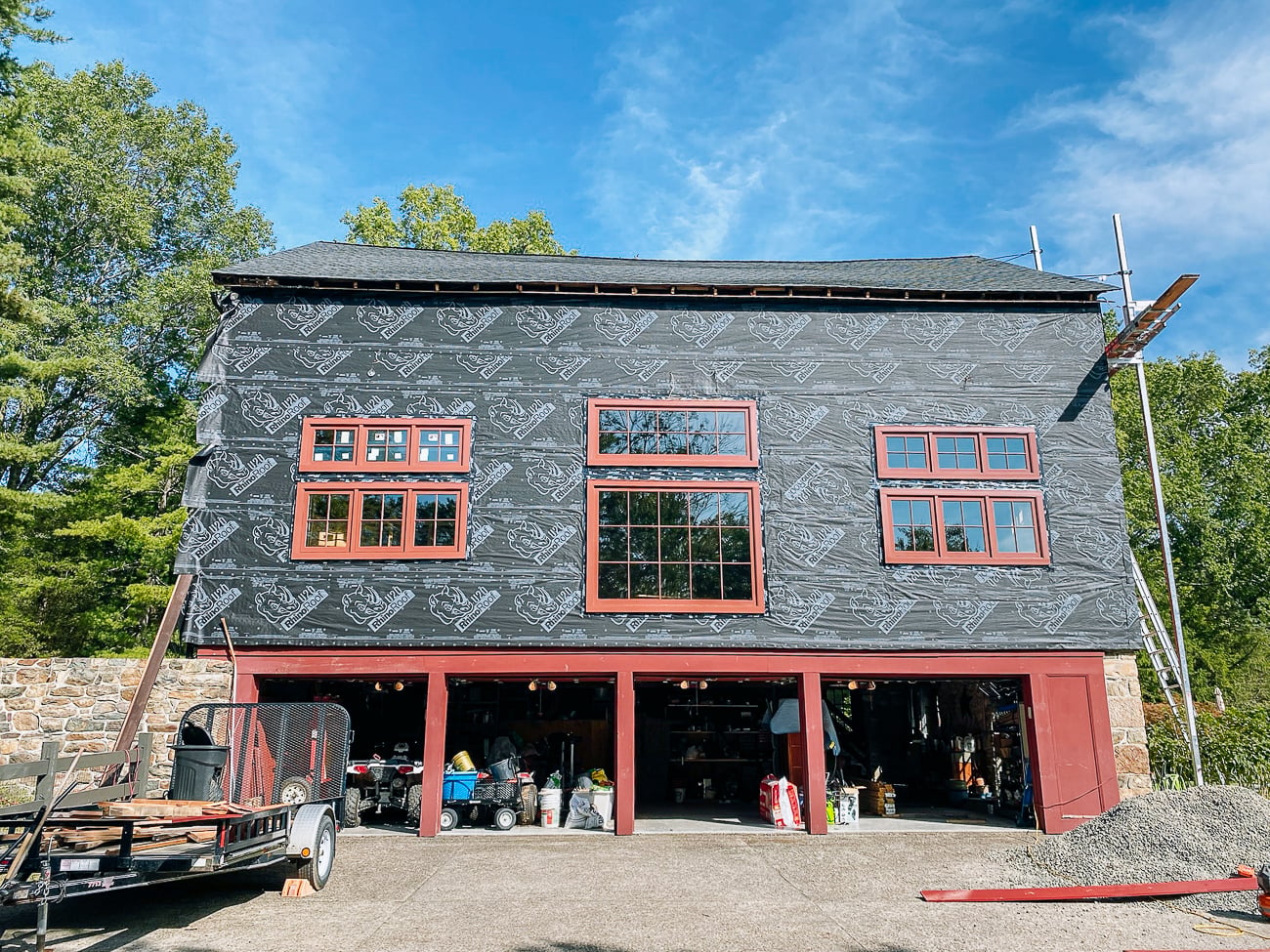 siding removed from barn with new windows