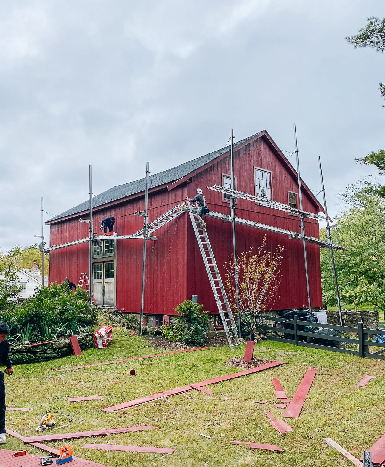 working on barn siding